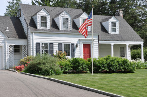 American flag in front yard of home