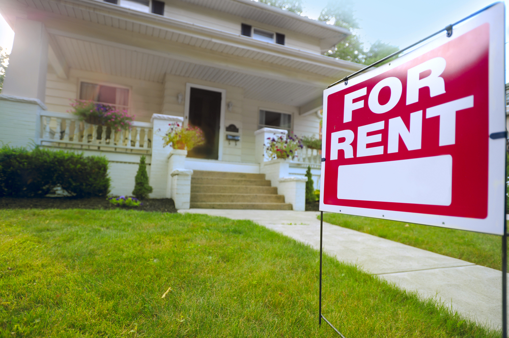 For rent sign in front yard